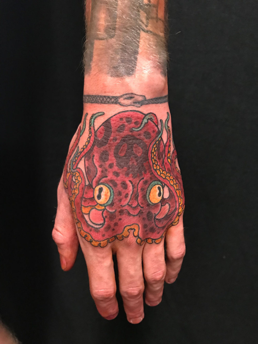 Octo Hand Tattoo
