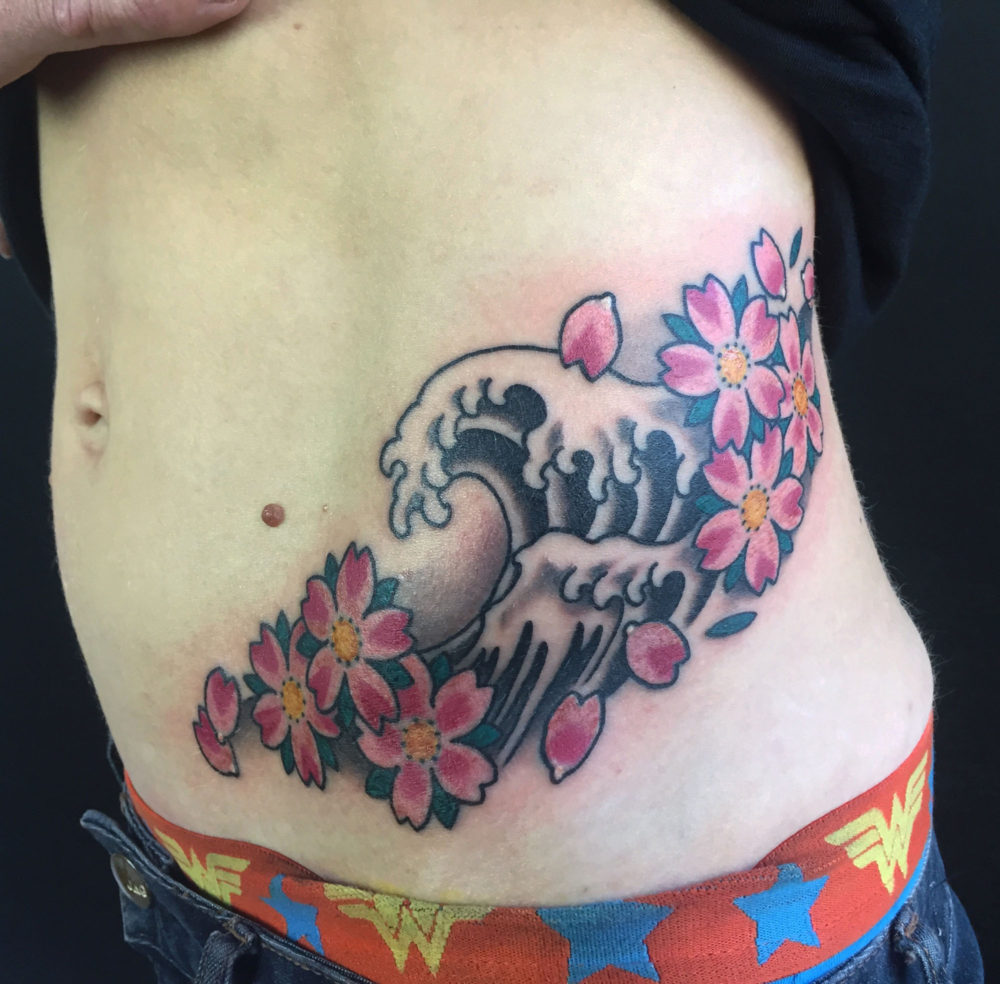 Wave and Blossom Tattoo